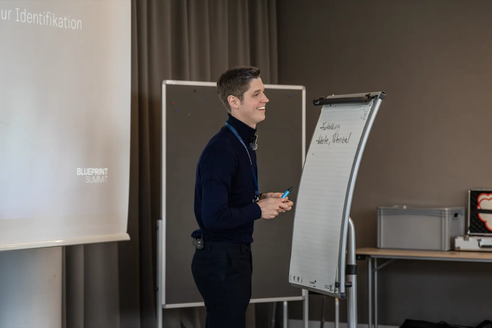 Redner am Flipchart